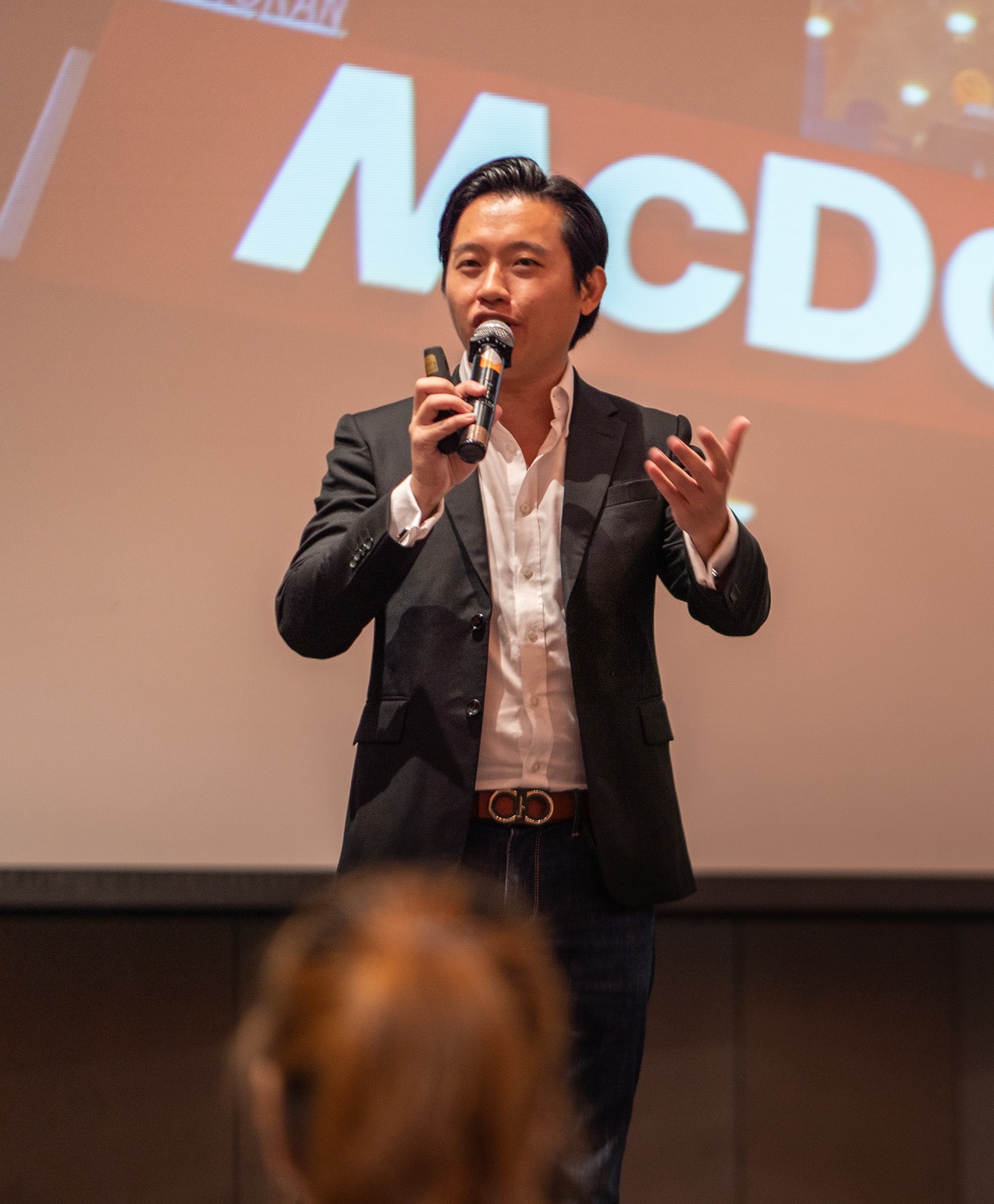 Ezekiel Chew speaking on stage